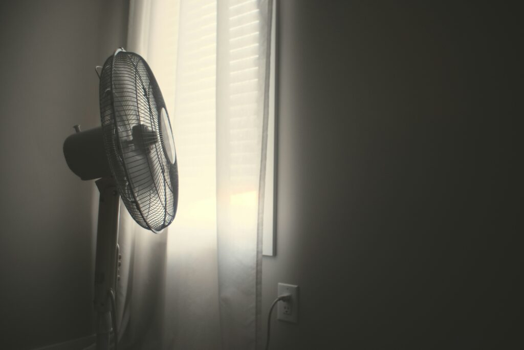 fan cooling bedroom during hot summer nights