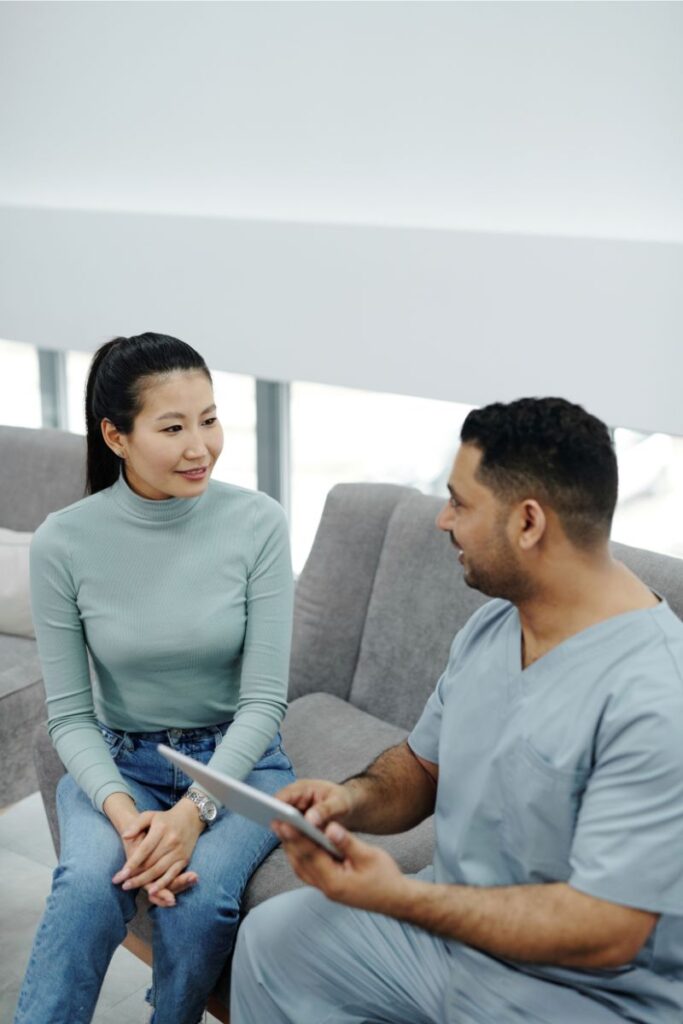 woman chatting with doctor because of waking up feeling restless